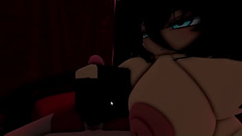 A dark man is given a handjob by a goth girl in a club