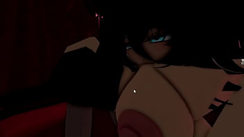 A dark man is given a handjob by a goth girl in a club