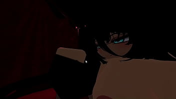 A dark man is given a handjob by a goth girl in a club