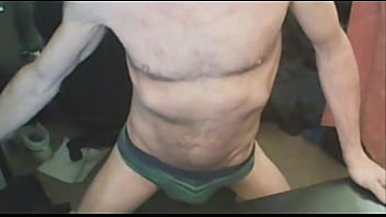 Groin bulge and torso on stool in tight underwear