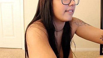 Bbw brunette puts a glass dildo in her pussy