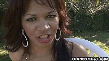 Tan Brunette Tranny Jerks Her Awesome Big Cock thumbnail