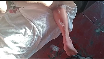 Spies on mature woman bathing