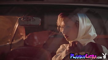 Bombastic small tits blonde hottie posing naked in her car