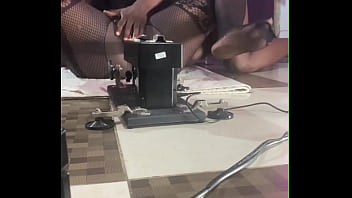 The blackpussy porn star fucks a sex machine with smooth operator