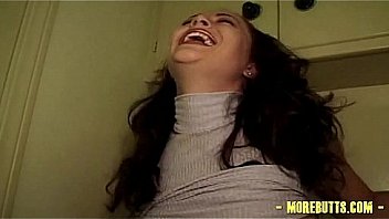 Brunette squeezes out enema juice