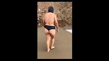 How nice chubby mexican girl strips naked on the beach