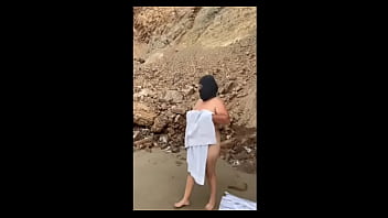 How nice chubby mexican girl strips naked on the beach