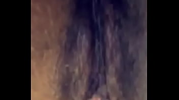 Latin teen rubbs her pussy