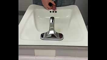 Me Pissing Through A Penis Plug In The Mirror After Partying At The Office thumbnail