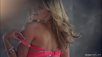 Athletic blonde model passionately fucks a big white cock