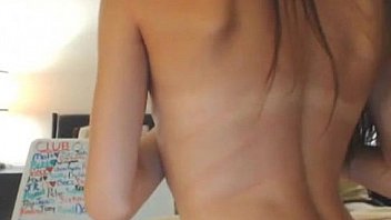 Babe stroking a huge dildo