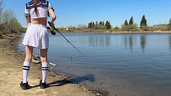 Young angler girl went to fish after school