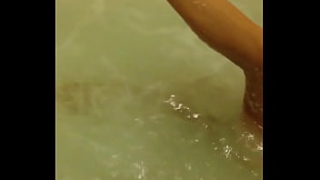 Hot blonde cougar naked in jacuzzi