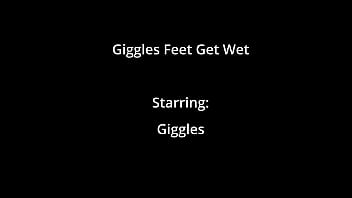 Giggles' feet get wet at the beach on beat2feetcom