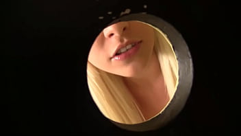 Blonde with big boobs stevie shae sucks cock through a bathroom glory hole