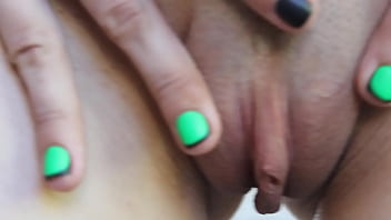 Flexible brunette naked doing sports in an abandoned house