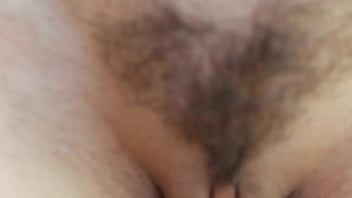 Flexible brunette naked doing sports in an abandoned house