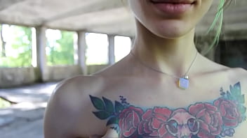 Flexible brunette naked doing sports in an abandoned house