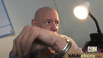 Huge cocks cover their black face in cum 20