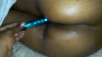 Sliding dildo in ebony black wife wet pussy