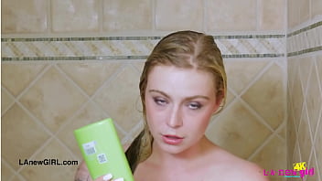 Attractive young model enjoys a sensual bath