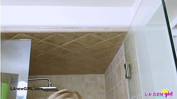 Attractive young model enjoys a sensual bath