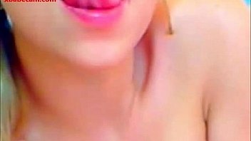 Sexy young blond naked masturbating fingers her wet pussy