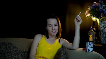 Sucking on a cigarette and looking at you