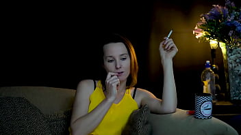 Sucking on a cigarette and looking at you