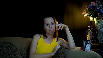 Sucking on a cigarette and looking at you