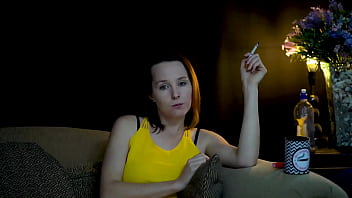 Sucking on a cigarette and looking at you