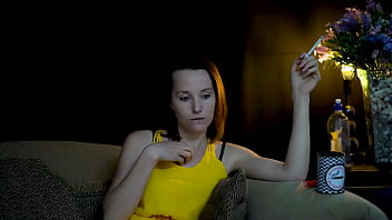 Sucking on a cigarette and looking at you