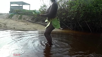 Busty african witch grinding her thick body in ritual dance and cleansing in sacred water