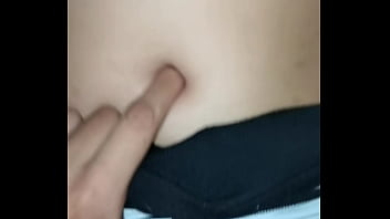 I peck her belly button while she rides me