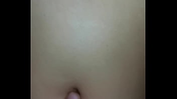 I peck her belly button while she rides me