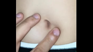 I peck her belly button while she rides me