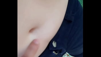 Playing with her belly button in the park part 2