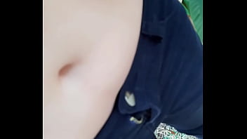 Playing with her belly button in the park part 2