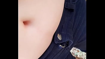 Playing with her belly button in the park part 2