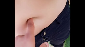 Playing with her belly button in the park part 2