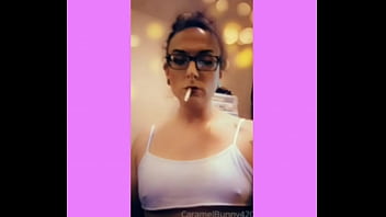 Horny shemale snowbunny tgirl seductively smoking w her tits perked up