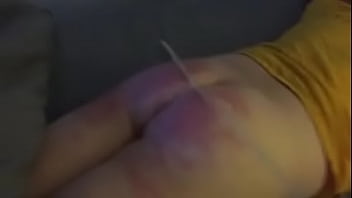 Caning his ass
