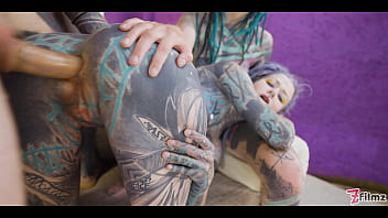 Inked babe gets down and dirty in a threesome with two edgy alternative girls