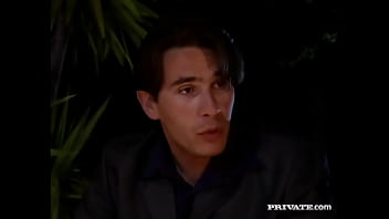 Mandy bright sits in the water along the beach while riding a fat dick