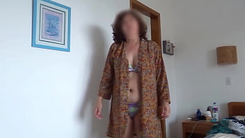 My wife's beautiful stepsister shows off in a bikini on the beach and in stockings with garters