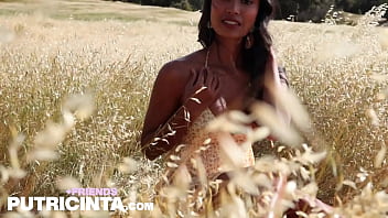 Sexy putri cinta lounges in the grass confidently showing off her pussy