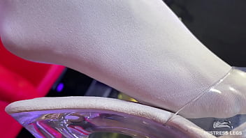 I sit on the couch in sexy white stockings and dangle my heels