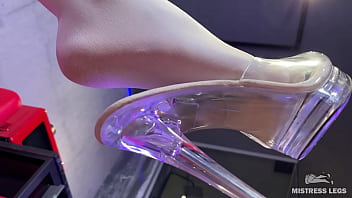 I sit on the couch in sexy white stockings and dangle my heels I sit on the couch in sexy white stockings and dangle my heels