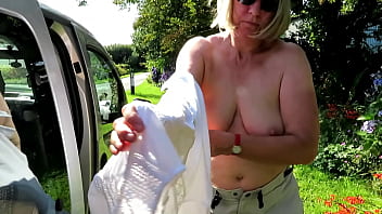 Swapping top beside car